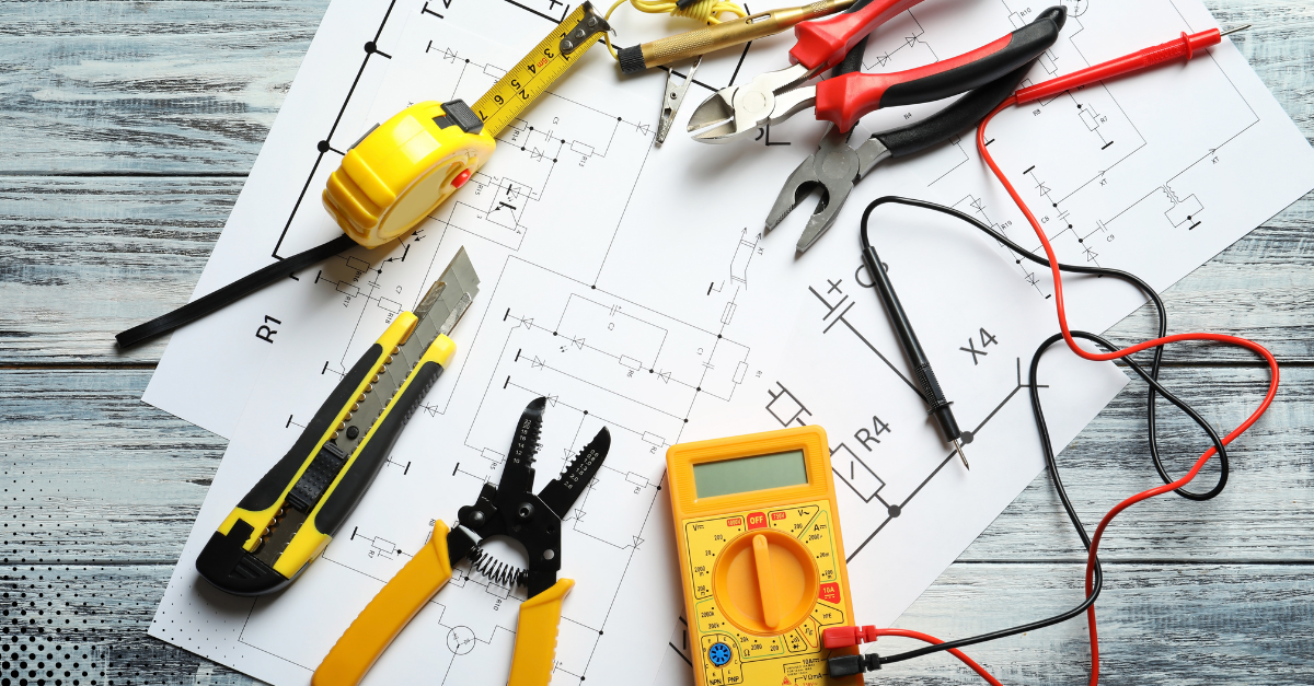 Electrical tools and wiring plans used during a home inspection.
